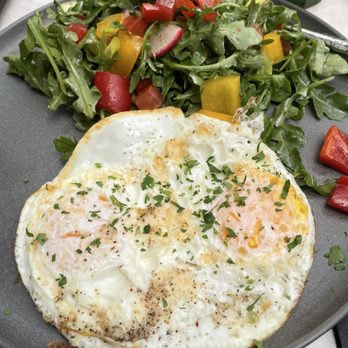 Nua - Israeli breakfast with over easy eggs - Middle Eastern Near Me - Beverly Hills, California Nua - Israeli breakfast with over easy eggs - Middle Eastern Near Me - Beverly Hills, California
