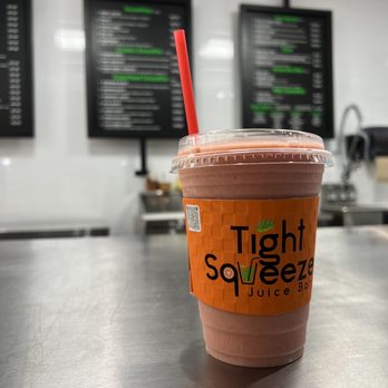 Tight Squeeze Juice Bar - Power Burst (Banana, Coconut Oil, Strawberry, Pineapple, Apple, and Vanilla Protein (Plant Based)) for $9.00 - Juice Bars & Smoothies Near Me - Houston, Texas Tight Squeeze Juice Bar - Power Burst (Banana, Coconut Oil, Strawberry, Pineapple, Apple, and Vanilla Protein (Plant Based)) for $9.00 - Juice Bars & Smoothies Near Me - Houston, Texas