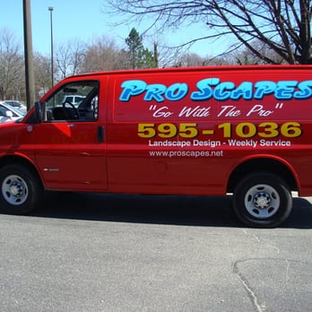 Pro Scapes - a red van parked in a parking lot - Landscape Architects or Designers Near Me Pro Scapes - a red van parked in a parking lot - Landscape Architects or Designers Near Me