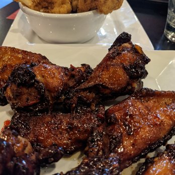 Blackstone's Smokehouse - Thai chili wings and fried cauliflower - Irish Pub Near Me - Flint, Michigan