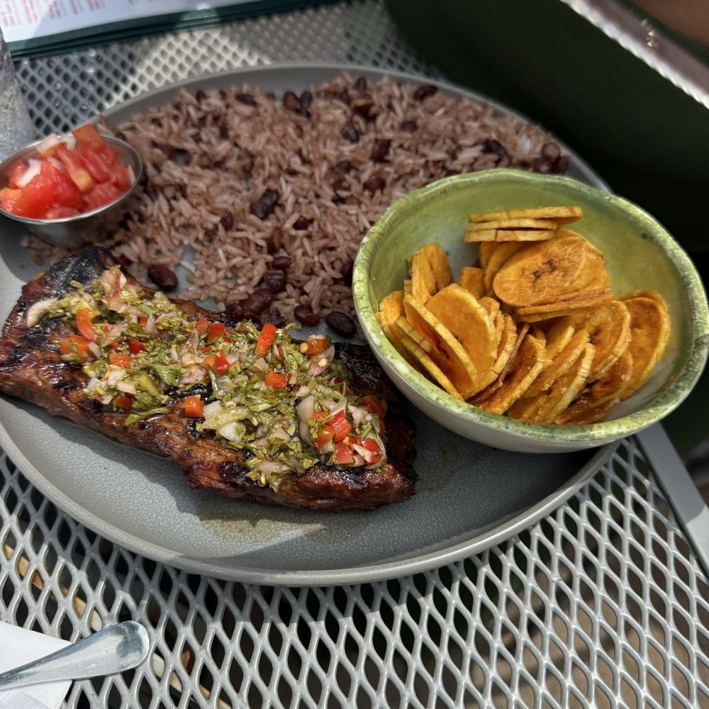 Guajiros Miami Eatery - Gallo pinto with steak and plantain chips - Coffee & Tea Near Me - Charlottesville, Virginia Guajiros Miami Eatery - Gallo pinto with steak and plantain chips - Coffee & Tea Near Me - Charlottesville, Virginia