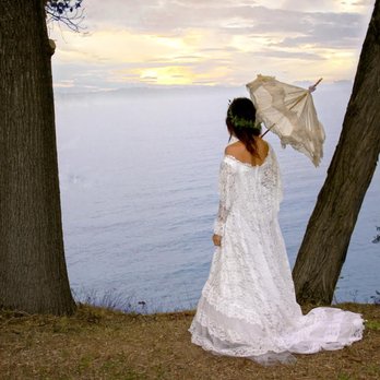 Misty Shores Events - a woman in a wedding dress holding an umbrella - Cafes Near Me - Ripley, New York Misty Shores Events - a woman in a wedding dress holding an umbrella - Cafes Near Me - Ripley, New York