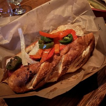 Wursthaus - pretzel bun with waygu beef and sauteed onions, jalapenos and bell peppers - Pubs Near Me - Santa Ana, California Wursthaus - pretzel bun with waygu beef and sauteed onions, jalapenos and bell peppers - Pubs Near Me - Santa Ana, California