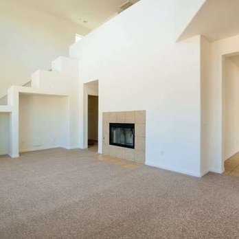 Lancaster Flooring - a living room with a fireplace - Flooring Near Me - Lancaster, California