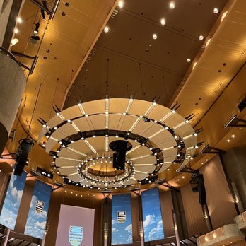 Chan Centre - a circular chandelier in a concert hall - Performing Arts Near Me - Vancouver, British Columbia