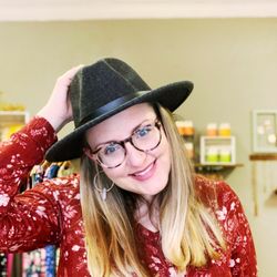 Amarah Studio and Boutique - Owner, Amanda rocking Amarah fedora hat, dress and earrings!