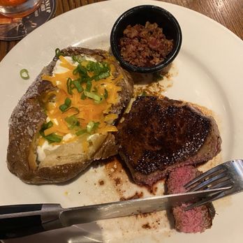 LongHorn Steakhouse - Sirloin steak with a baked potato and bacon on the side - Steakhouses Near Me - Cypress, Texas LongHorn Steakhouse - Sirloin steak with a baked potato and bacon on the side - Steakhouses Near Me - Cypress, Texas