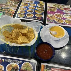 La Marea Restaurant & Seafood - Chip, salsa and cheese sauce..not Queso