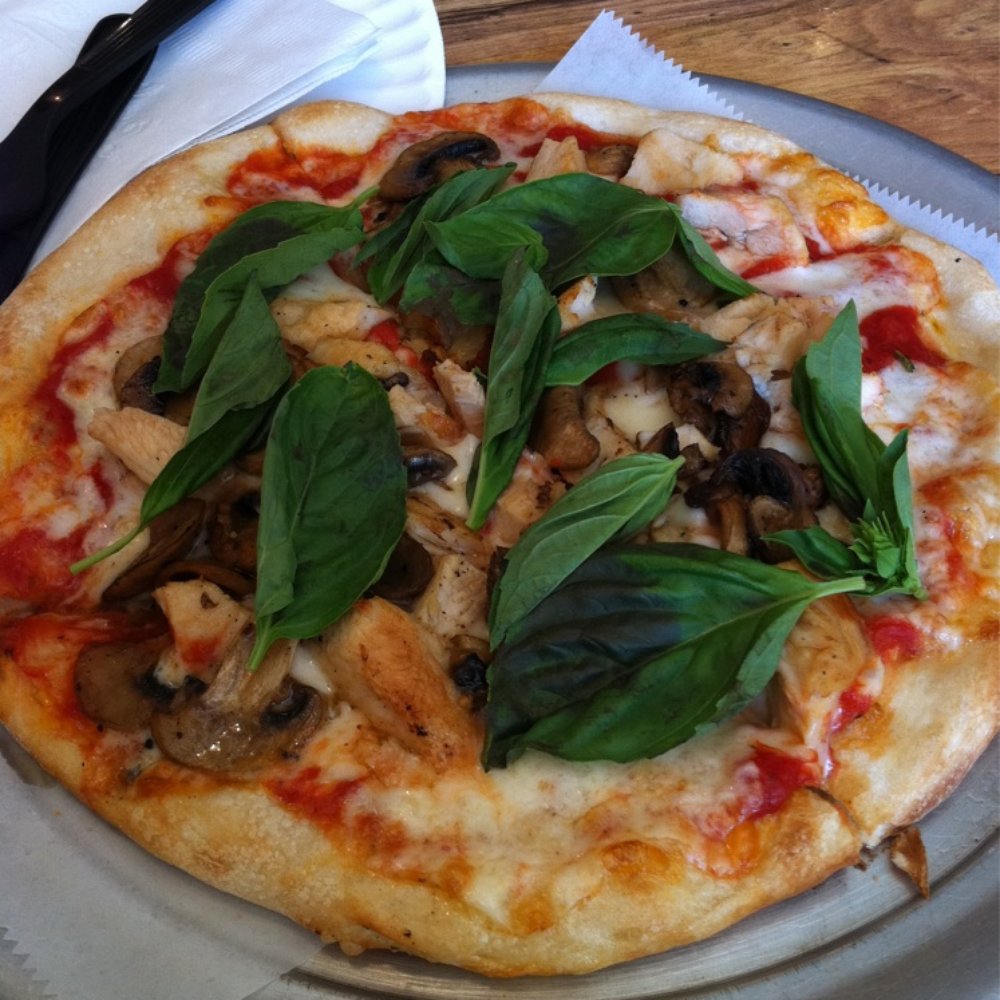 Buona Pizza - a pizza with mushrooms and spinach leaves - Pizza Near Me - Bernardsville, New Jersey Buona Pizza - a pizza with mushrooms and spinach leaves - Pizza Near Me - Bernardsville, New Jersey