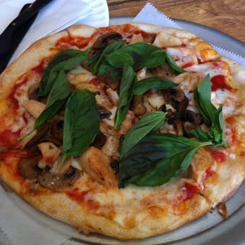 Buona Pizza - a pizza with mushrooms and spinach leaves - Pizza Near Me - Bernardsville, New Jersey Buona Pizza - a pizza with mushrooms and spinach leaves - Pizza Near Me - Bernardsville, New Jersey