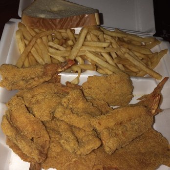 T P Seafood - Fried fish and shrimp with fries - Seafood Markets Near Me - Houston, Texas