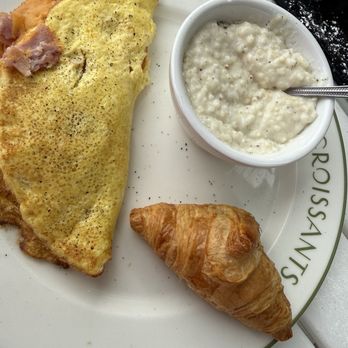 Croissants Bistro & Bakery - Ham and cheese omelette with grits - Bakeries Near Me - Myrtle Beach, South Carolina Croissants Bistro & Bakery - Ham and cheese omelette with grits - Bakeries Near Me - Myrtle Beach, South Carolina
