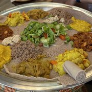 Photo of Zeni Ethiopian Restaurant - San Jose, CA, United States. Gebeta with chicken, beef, lamb