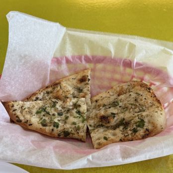 Curries & Biryanis - Garlic naan - Buffets Near Me - Folsom, California