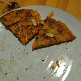 Taste Korea 232 - Kimchi PaJeon pancake. It was so good I only remembered to take a picture at the last minute. - Korean Near Me - Brooklyn, New York