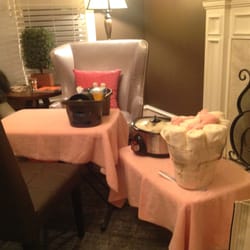 When we come to your home we do a lovely set up that includes fresh hot towels, tables, and a large selection of polish.