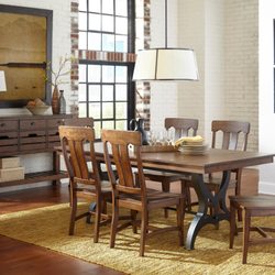 Creative Dinettes & Bar Stools Furniture Store - This industrial chic dining set is really turning heads in our showroom. Stop in and see it for yourself!