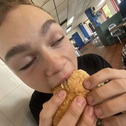 Zax Drive Inn - One of the burger boys takin a big ol juicy bite