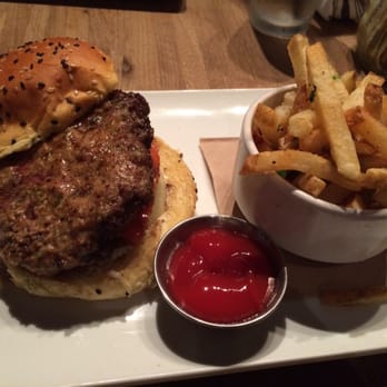 Eureka! - The Bone Marrow Burger - the cooked marrow is drizzled over the party - American Near Me - Berkeley, California