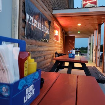 Ryders Saloon - a picnic table with ketchup and condiments - American Near Me - Henriette, Minnesota Ryders Saloon - a picnic table with ketchup and condiments - American Near Me - Henriette, Minnesota
