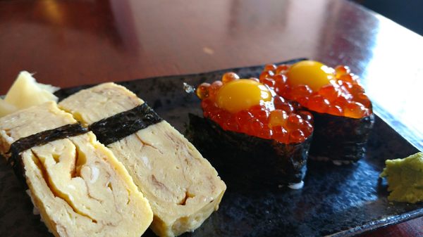 Photo of We Be Sushi - San Francisco, CA, US. Ikura with quail egg and tamago