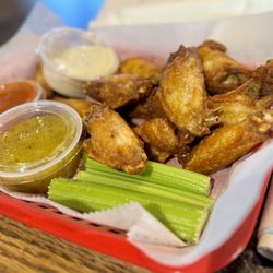 Lillian's Pizza - Naked wings with garlic parm & mild sauces on the side!