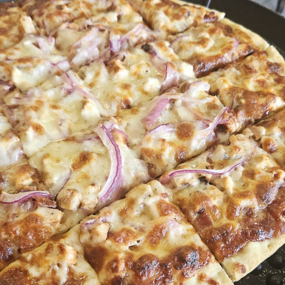 Legends Pizza - BBQ pizza with chicken. Comes with red onion and bacon. - Pizza Near Me - Carol Stream, Illinois Legends Pizza - BBQ pizza with chicken. Comes with red onion and bacon. - Pizza Near Me - Carol Stream, Illinois