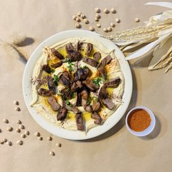 Shatila Lebanese Grill & Hookah Lounge - Large Hummus topped with our mouthwatering Lamb Kabab