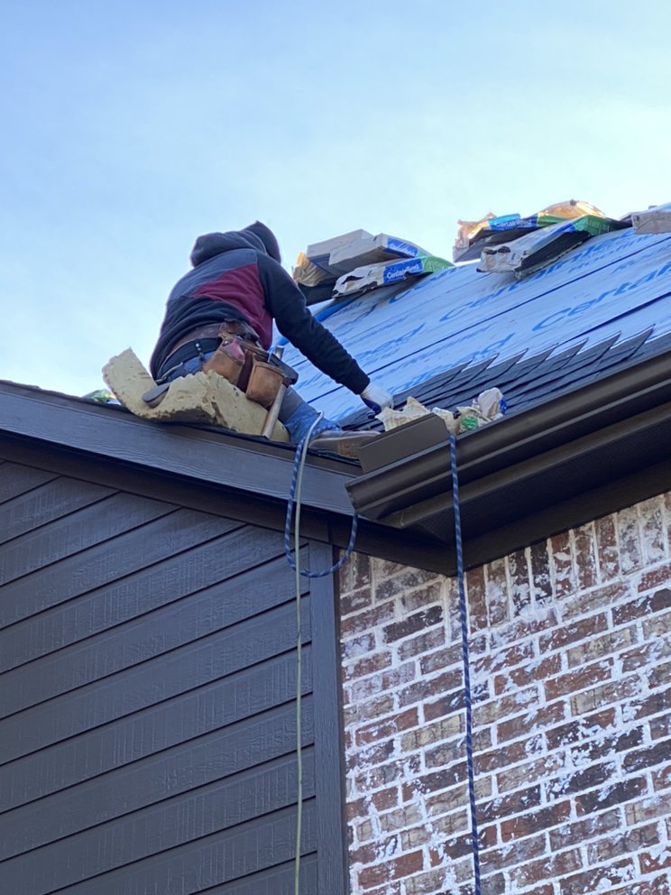 Slide of Hello Roofing