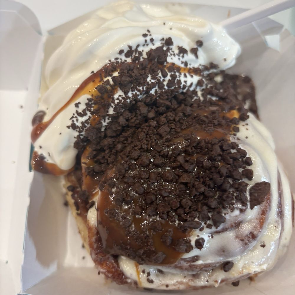 A Cinnabon roll with ice cream A Cinnabon roll with ice cream