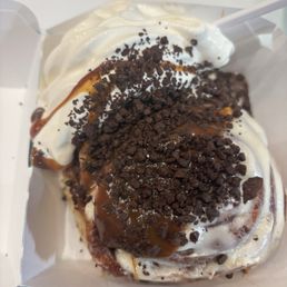 A Cinnabon roll with ice cream