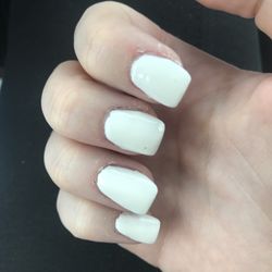 Ultra Nails & Tanning - Horrible, crooked nails! Never go here. My fingers are covered in acrylic. Worst nails I've ever had done