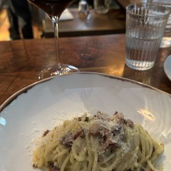 Passatempo Taverna - Spaghetti Carbonara and a glass in house Tempranillo. - Italian Near Me - Walla Walla, Washington Passatempo Taverna - Spaghetti Carbonara and a glass in house Tempranillo. - Italian Near Me - Walla Walla, Washington
