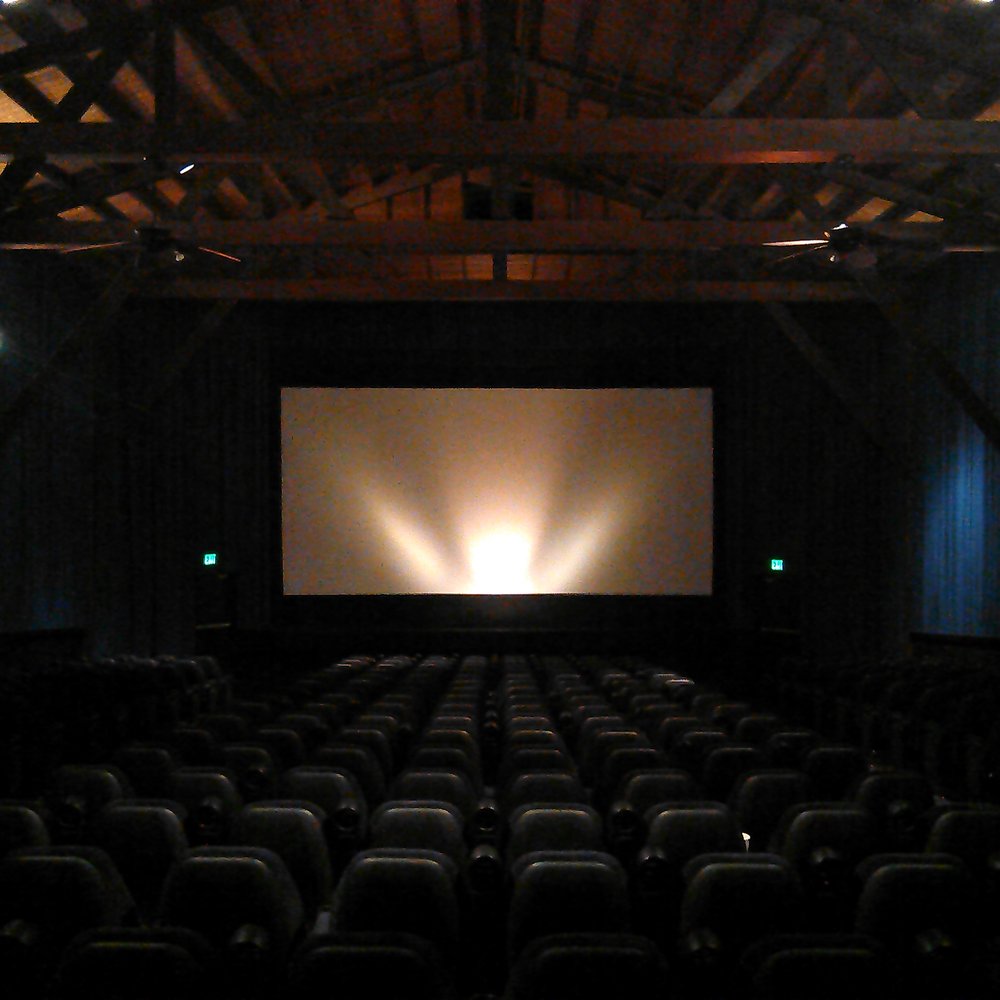 Modern seating and sound system yet old-fashioned wooden beams. Modern seating and sound system yet old-fashioned wooden beams.