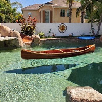 Aqua Clear Pool Services - A client sent us this picture of his new canoe being tested out in his pool.  The canoe looks like it's superimposed on the pool water. - Pool Cleaners Near Me - El Cajon, California