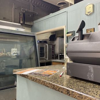 Oasis Bakery & Eatery - a counter with a coffee machine - Mediterranean Near Me - Lakewood, Ohio Oasis Bakery & Eatery - a counter with a coffee machine - Mediterranean Near Me - Lakewood, Ohio