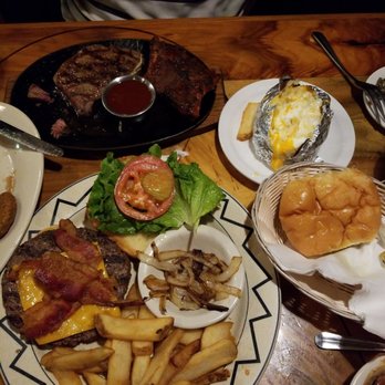 Silver Saddle Steakhouse - Steak, ribs, and a burger patty that's big as a salad plate. Check out the apps... we got half mushrooms ...and half zucchini deep fried! - Steakhouses Near Me - Tucson, Arizona Silver Saddle Steakhouse - Steak, ribs, and a burger patty that's big as a salad plate. Check out the apps... we got half mushrooms ...and half zucchini deep fried! - Steakhouses Near Me - Tucson, Arizona