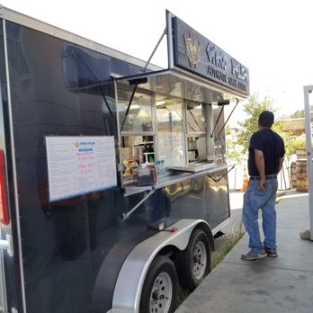 Gyros Delish - a man standing in front of a food truck - Greek Near Me - Breckenridge, Colorado Gyros Delish - a man standing in front of a food truck - Greek Near Me - Breckenridge, Colorado