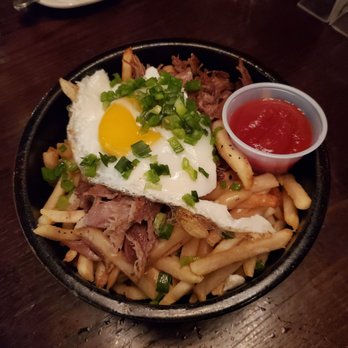 Common Theory - Duck Fat Fries with egg and duck skin = heavy but yummy - Gastropubs Near Me - San Diego, California