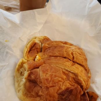 Rose Donuts - Bacon, egg, & cheese croissant with large iced Vietnamese coffee - Coffee & Tea Near Me - San Diego, California