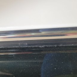 Can clearly see the ripped and shredded weatherstripping Can clearly see the ripped and shredded weatherstripping