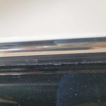 Grand Tint Auto - Can clearly see the ripped and shredded weatherstripping - Car Window Tinting Near Me Grand Tint Auto - Can clearly see the ripped and shredded weatherstripping - Car Window Tinting Near Me