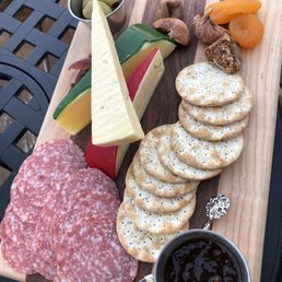 a charcutette and cheese board a charcutette and cheese board