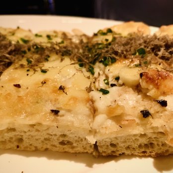 RPM Steak - Truffled Cheese-Baked Focaccia - Steakhouses Near Me - Chicago, Illinois RPM Steak - Truffled Cheese-Baked Focaccia - Steakhouses Near Me - Chicago, Illinois