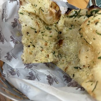 Mantra by Indian Garden - Garlic naan. - Indian Near Me - Schiller Park, Illinois Mantra by Indian Garden - Garlic naan. - Indian Near Me - Schiller Park, Illinois