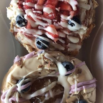 Mojo Donuts - Blueberry Apple Tart on the bottom and a Deco Deluxe on the top. - Donuts Near Me - Pembroke Pines, Florida Mojo Donuts - Blueberry Apple Tart on the bottom and a Deco Deluxe on the top. - Donuts Near Me - Pembroke Pines, Florida