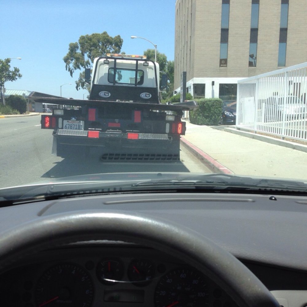 A Checkered Towing - I'm sitting in my car looking foolish.  On the corner of Columbia and LB blvd. - Towing Near Me - Long Beach, California