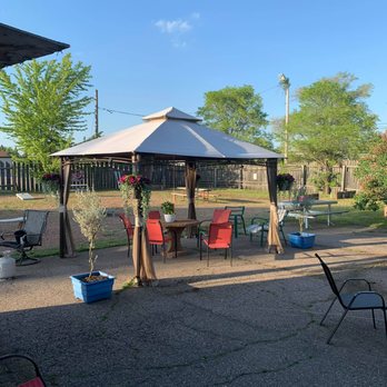 Cabaret - a patio with a table and chairs - Pubs Near Me - Wausau, Wisconsin Cabaret - a patio with a table and chairs - Pubs Near Me - Wausau, Wisconsin
