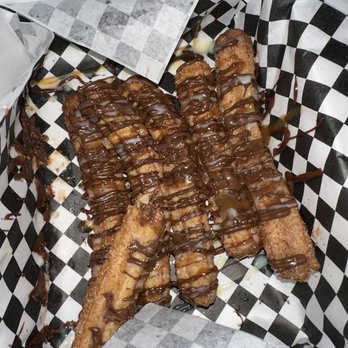 Churro Addict - one of their best sellers, churros sucios w cajeta, nutella, and condensed milk - Food Trucks Near Me - San Diego, California Churro Addict - one of their best sellers, churros sucios w cajeta, nutella, and condensed milk - Food Trucks Near Me - San Diego, California
