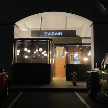 Takumi Maui - Outside-- two small outside tables with a takeout window - Sushi Bars Near Me - Lahaina, Hawaii Takumi Maui - Outside-- two small outside tables with a takeout window - Sushi Bars Near Me - Lahaina, Hawaii